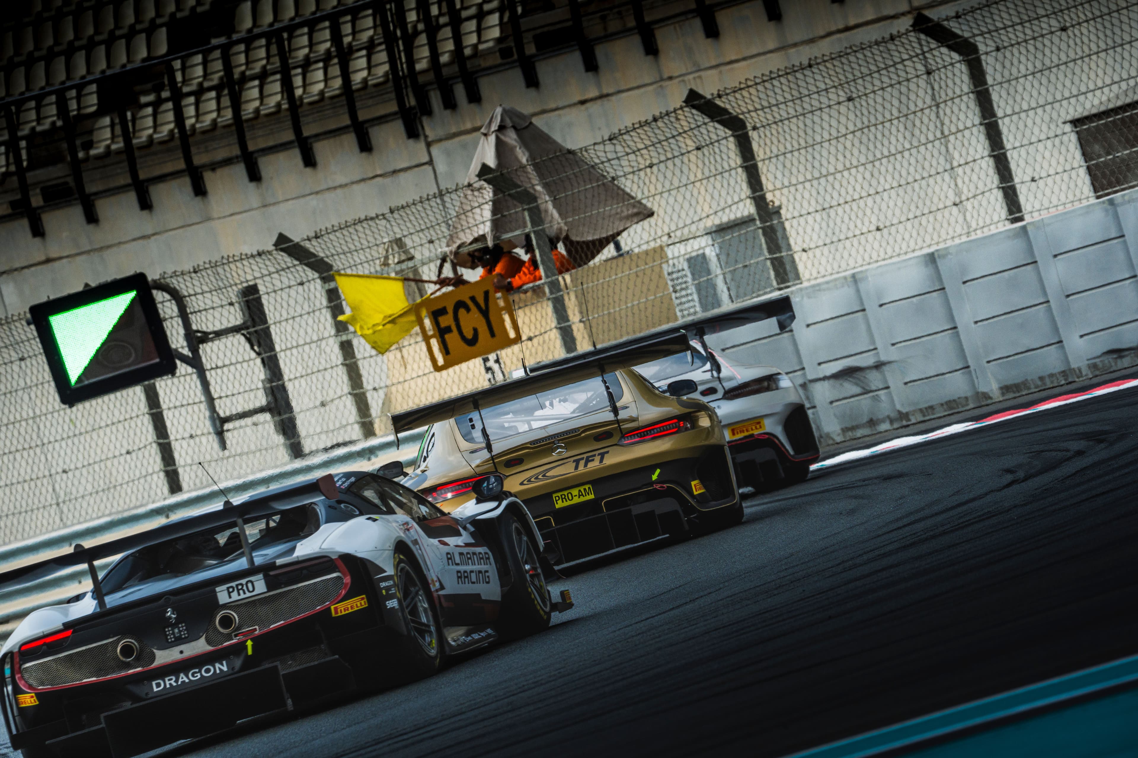 GT Series endurance race cars lined up on track